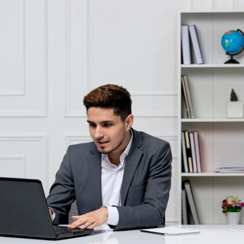 customer-service-cute-handsome-guy-office-suit-with-computer-typing-keyboard freelance digital marketer in Calicut