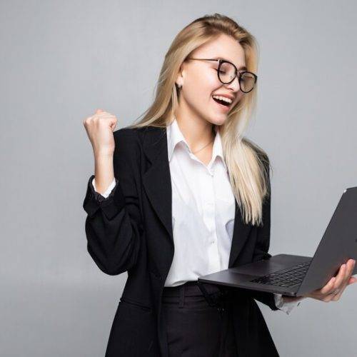 portrait-young-happy-business-woman-with-laptop-with-win-gesture_231208-245 freelance digital marketer in Calicut
